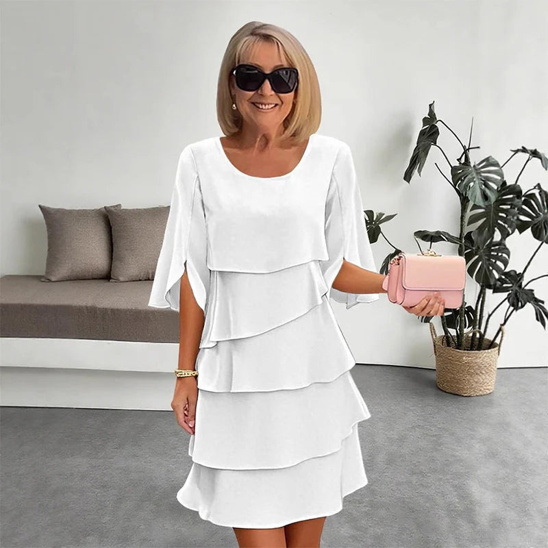 😜40% árcsökkentés👗🌸 Elegáns réteges környakú ruha – Lebegő sziluett, sokoldalú egyszínű, S–3XL-ig! ✨💃