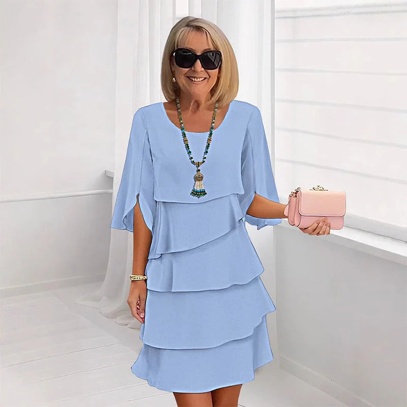 😜40% árcsökkentés👗🌸 Elegáns réteges környakú ruha – Lebegő sziluett, sokoldalú egyszínű, S–3XL-ig! ✨💃
