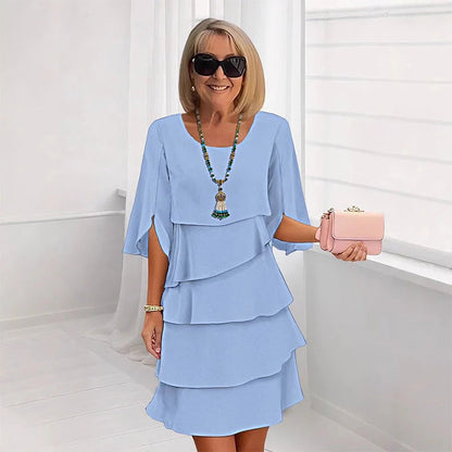 😜40% árcsökkentés👗🌸 Elegáns réteges környakú ruha – Lebegő sziluett, sokoldalú egyszínű, S–3XL-ig! ✨💃