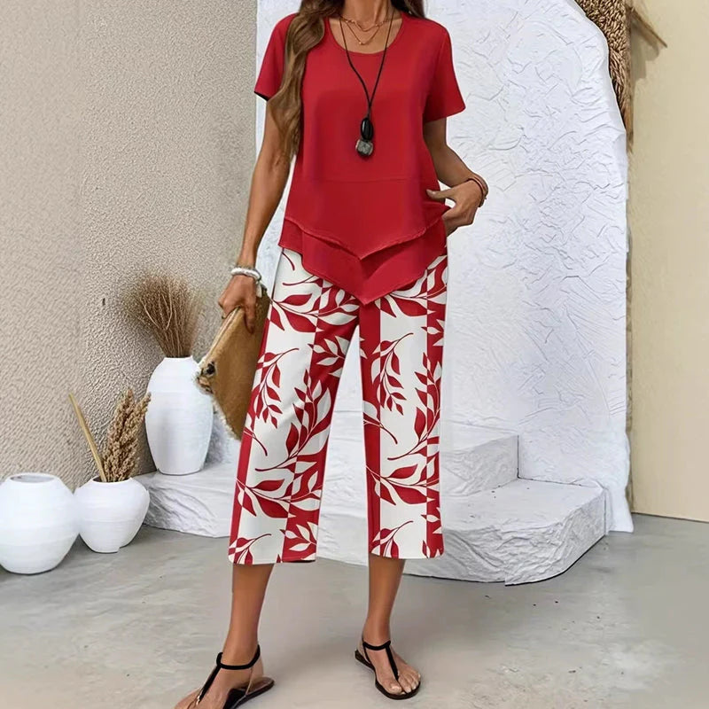 💝49% kedvezmény🎁Ingyenes gyönyörű nyaklánc💜Modern drapírozott tunika szett S–5XL🌿Aszimmetrikus réteges kétrészes szett – Levélmintás nadrág, könnyű légáteresztő viselet!