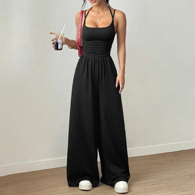 💥50% árcsökkentés 🎁Ingyenes ajándék-📿Gyönyörű nyaklánc🌿 Légáteresztő női együttes✨ Spagetti pántos jumpsuit – Magas derékú, széles szárú és stílusos!