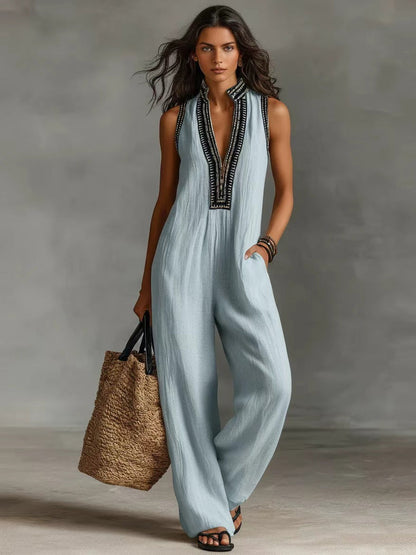 😍2026 tavaszi újdonságok🎉47% árcsökkentés🧶 Etnikai hímzéses pamut-len jumpsuit – Mély V-nyakú állógalléros, ujjatlan széles szárú kialakítás!☀️Laza szabás, természetes anyag, sokoldalú női viselet!