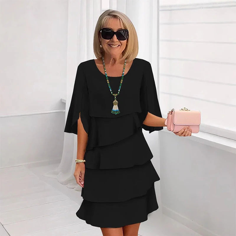 😜40% árcsökkentés👗🌸 Elegáns réteges környakú ruha – Lebegő sziluett, sokoldalú egyszínű, S–3XL-ig! ✨💃