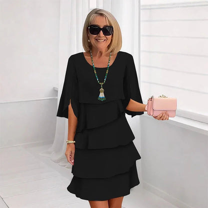 😜40% árcsökkentés👗🌸 Elegáns réteges környakú ruha – Lebegő sziluett, sokoldalú egyszínű, S–3XL-ig! ✨💃