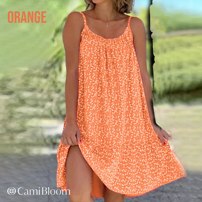 🎁Ingyenes ajándék -📿Gyönyörű nyaklánc🌿 Térdig érő laza camisole ruha🌸 CamiBloom virágmintás spagetti pántos ruha – Jégselyem anyag, állítható pántok, nyári kényelem!