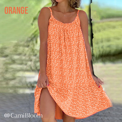 🎁Ingyenes ajándék -📿Gyönyörű nyaklánc🌿 Térdig érő laza camisole ruha🌸 CamiBloom virágmintás spagetti pántos ruha – Jégselyem anyag, állítható pántok, nyári kényelem!