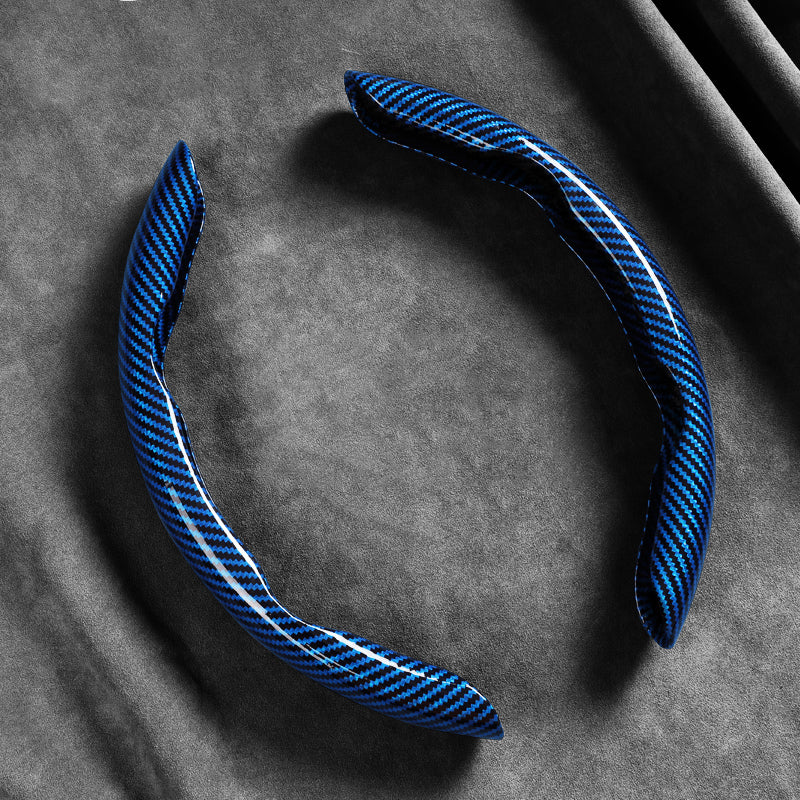 🚗✨ Szénszálas kormánykerék-huzat – Pillangó ihletésű ergonomikus design, 30%-kal nagyobb felületi súrlódás! 🛡️💪