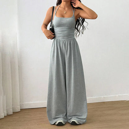 💥50% árcsökkentés 🎁Ingyenes ajándék-📿Gyönyörű nyaklánc🌿 Légáteresztő női együttes✨ Spagetti pántos jumpsuit – Magas derékú, széles szárú és stílusos!