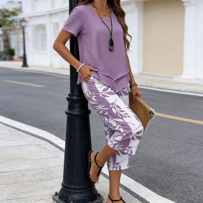 💝49% kedvezmény🎁Ingyenes gyönyörű nyaklánc💜Modern drapírozott tunika szett S–5XL🌿Aszimmetrikus réteges kétrészes szett – Levélmintás nadrág, könnyű légáteresztő viselet!