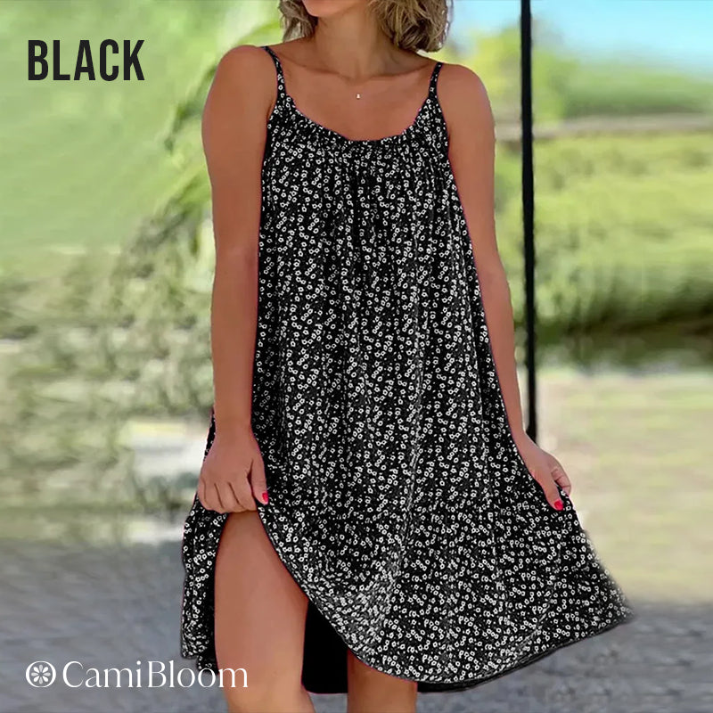 🎁Ingyenes ajándék -📿Gyönyörű nyaklánc🌿 Térdig érő laza camisole ruha🌸 CamiBloom virágmintás spagetti pántos ruha – Jégselyem anyag, állítható pántok, nyári kényelem!