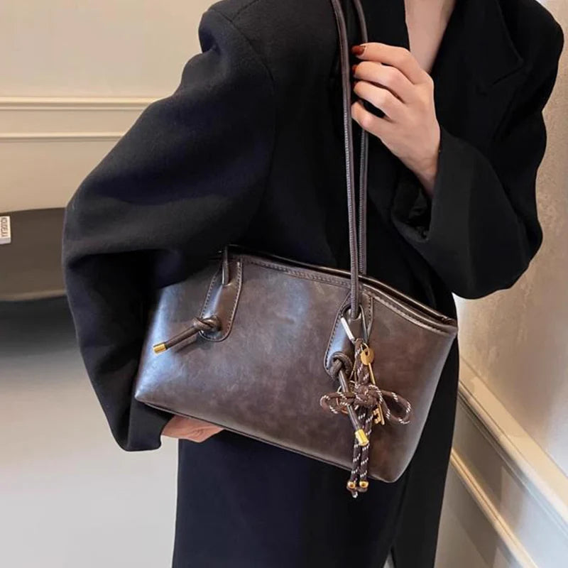 👍2026 Új modell😜30% árcsökkentés👜 Vintage stílusú PU bőr válltáska – Prémium minőség, praktikus és nőies mindennapi kiegészítő!