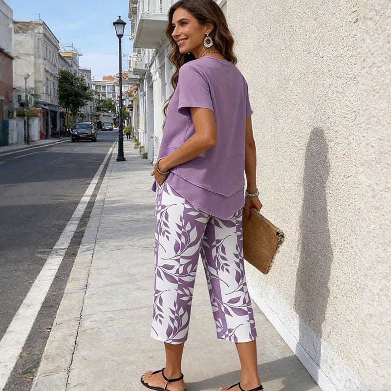 💝49% kedvezmény🎁Ingyenes gyönyörű nyaklánc💜Modern drapírozott tunika szett S–5XL🌿Aszimmetrikus réteges kétrészes szett – Levélmintás nadrág, könnyű légáteresztő viselet!