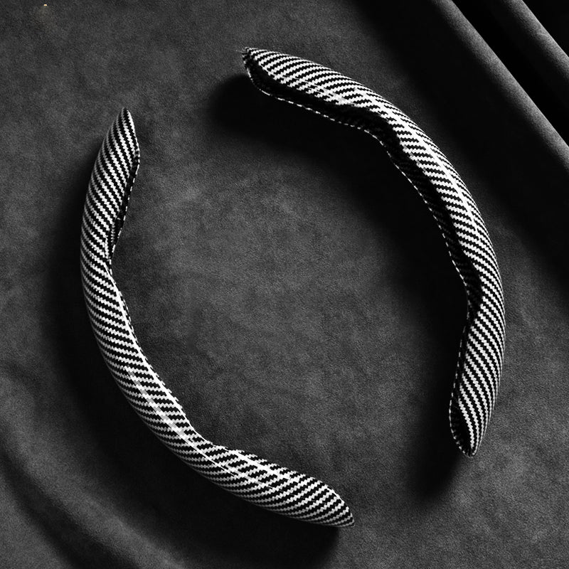 🚗✨ Szénszálas kormánykerék-huzat – Pillangó ihletésű ergonomikus design, 30%-kal nagyobb felületi súrlódás! 🛡️💪
