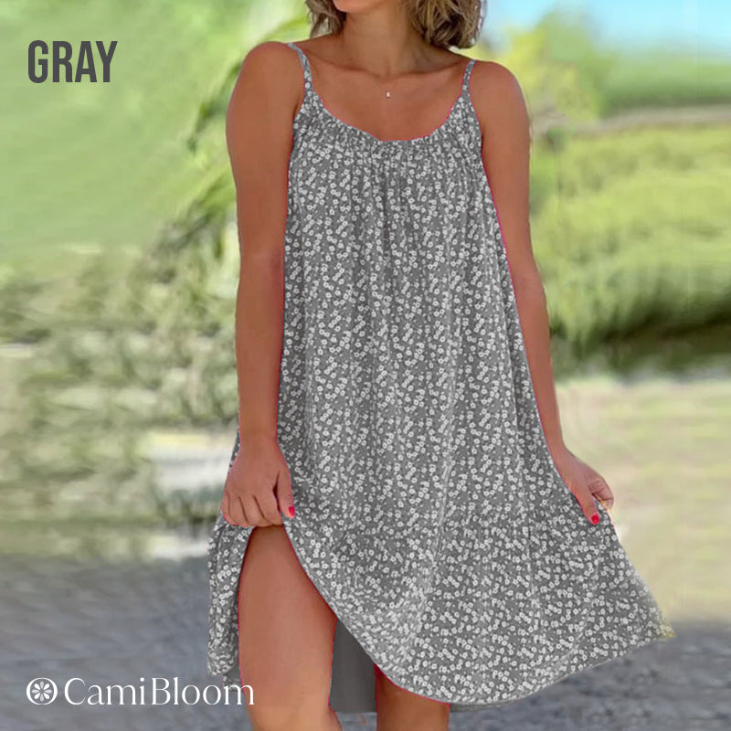 🎁Ingyenes ajándék -📿Gyönyörű nyaklánc🌿 Térdig érő laza camisole ruha🌸 CamiBloom virágmintás spagetti pántos ruha – Jégselyem anyag, állítható pántok, nyári kényelem!